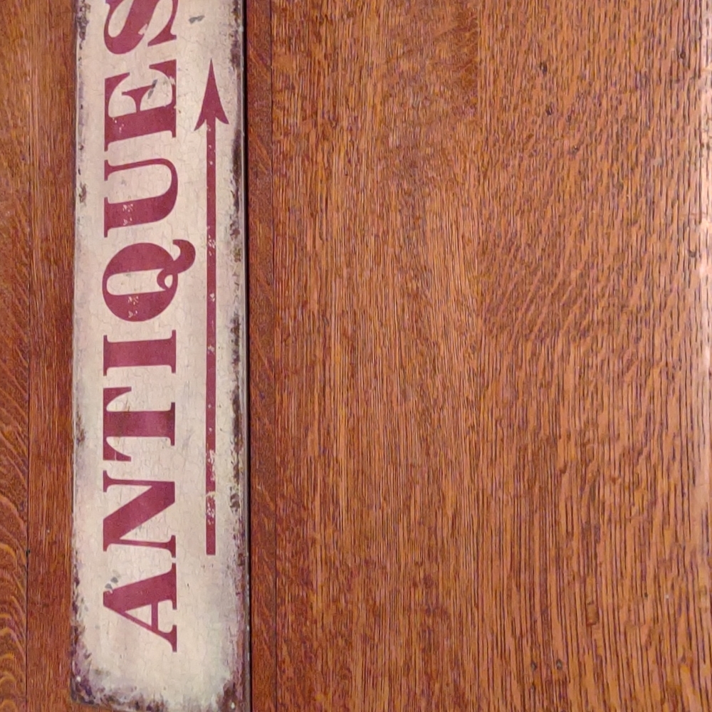 Tin antiques sign
